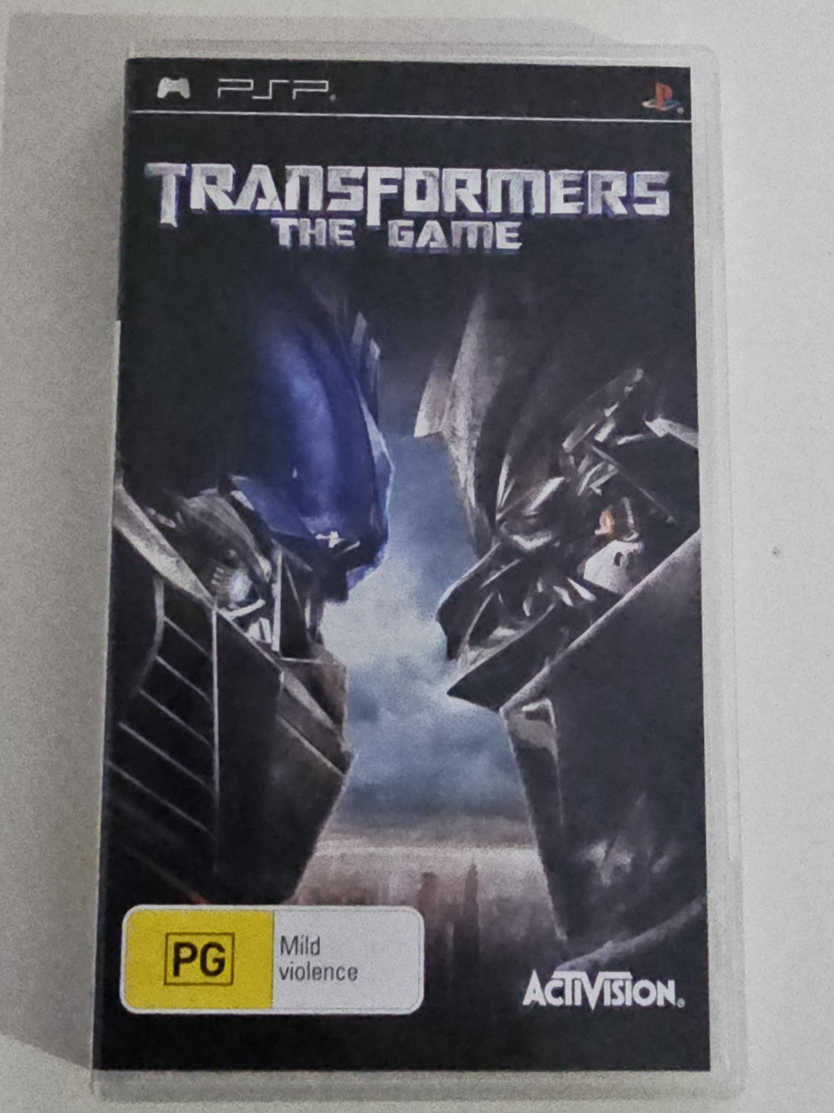 Transformers The Game (Sony PSP, 2007) Complete with Manual – Tested Working VGC PlayStation Retro Exchange Australia